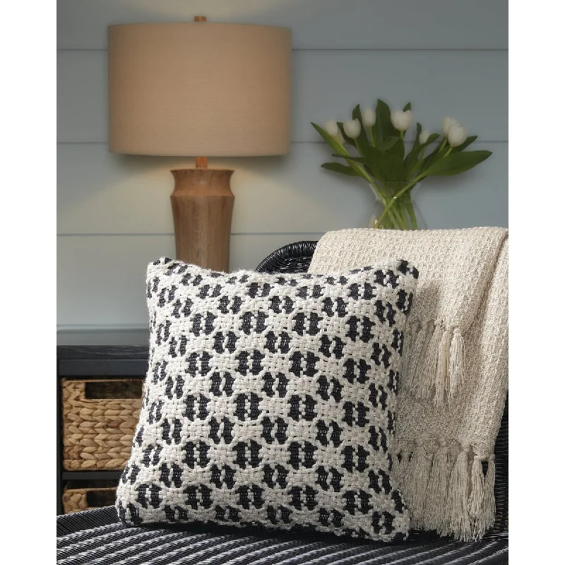 Round Pillows for Boho-Style InteriorsSignature Design by Ashley Bealer Black/Tan Indoor/Outdoor Pillow Round Pillows for Boho-Style InteriorsSignature Design by Ashley Bealer Black/Tan Indoor/Outdoor Pillow