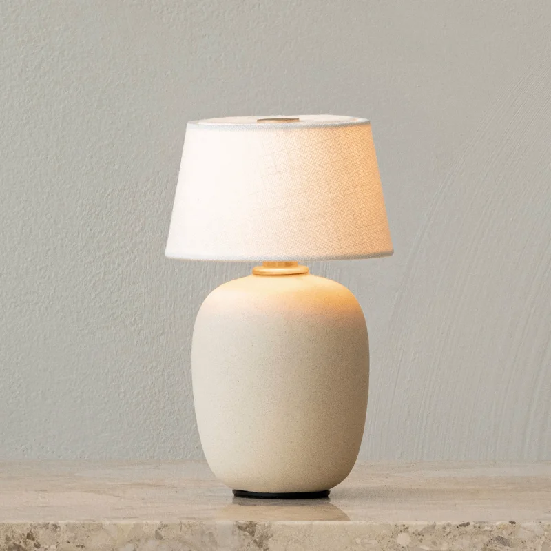 asian inspired table lamps with bamboo accents for a zen atmospherePortable Ceramic and Linen Table Lamp | Torso