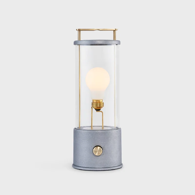 wooden table lamps with natural grain for a warm and organic feelThe Rugged Muse Portable Lamp in Raw Aluminium