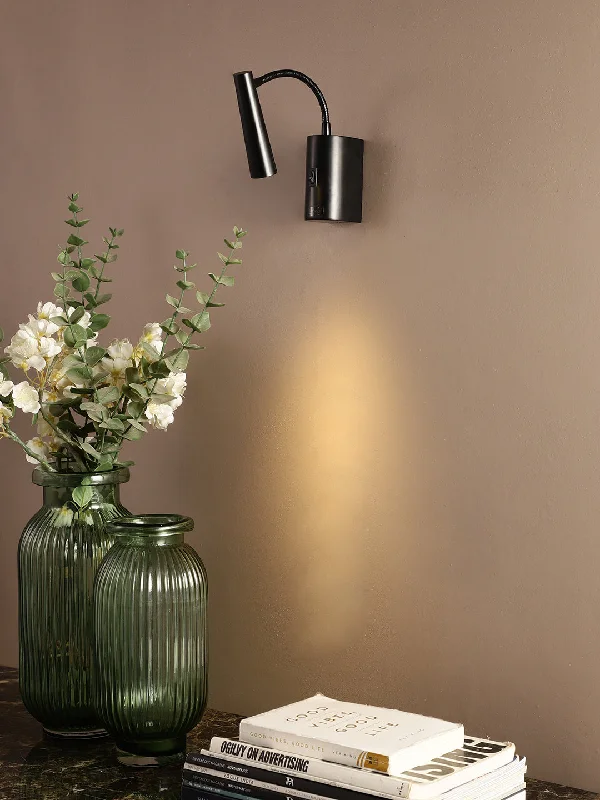 leather wall lamps with a distressed texture for a rugged and stylish lookArnel K Wall Light