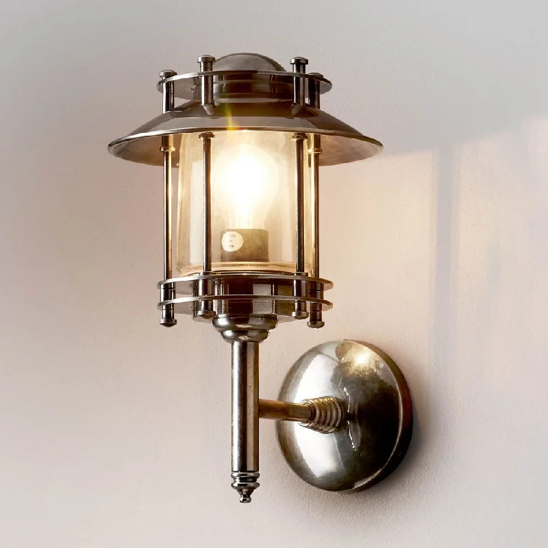 leather wall lamps with a distressed texture for a rugged and stylish lookTurner Wall Lamp Antique Silver