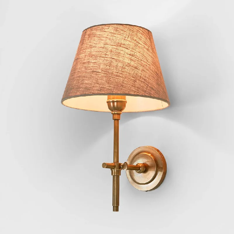 wood wall lamps with natural grain for a warm and organic feelDino Wall light Base Antique Brass