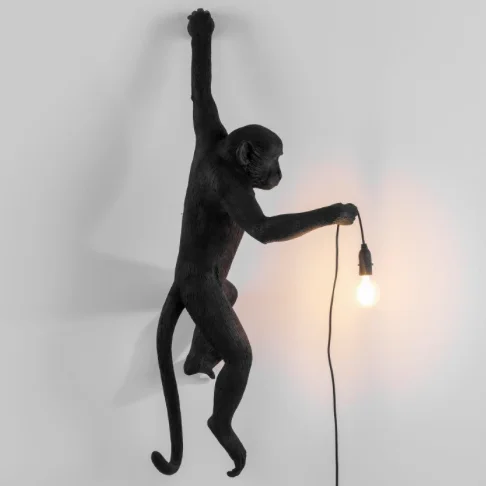 leather wall lamps with a distressed texture for a rugged and stylish lookSeletti Monkey Lamp Black Wall