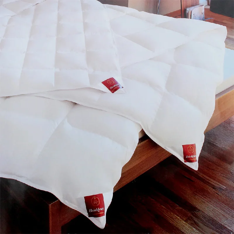 Polyester - filled duvets known for their durability and easy careAll Seasons Goose Down Duvet from Brinkhaus Polyester - filled duvets known for their durability and easy careAll Seasons Goose Down Duvet from Brinkhaus