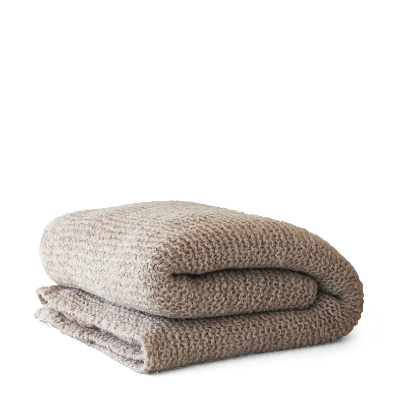 Alpaca wool blankets for a hypoallergenic and warm optionAlpaca sand knit blanket