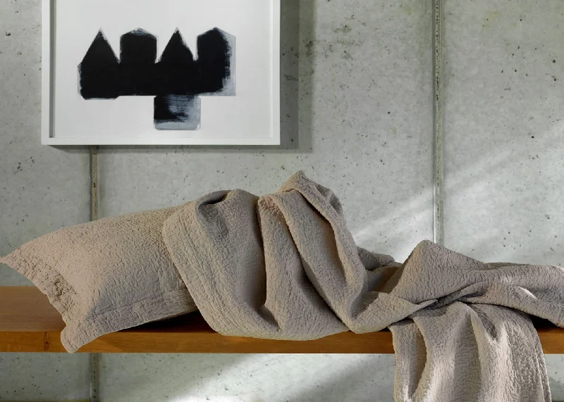 mid - century modern bedspreads with iconic shapes and colors for a stylish spaceAmalia "Tamara" Matellase Quilt Bedspread in Latte mid - century modern bedspreads with iconic shapes and colors for a stylish spaceAmalia "Tamara" Matellase Quilt Bedspread in Latte