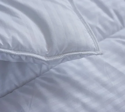 Polyester - filled duvets known for their durability and easy careAshton Eco Duvet