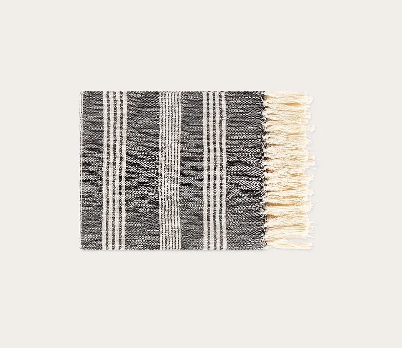 Linen blankets with a rustic and textured lookSurya Callan Throw Blanket
