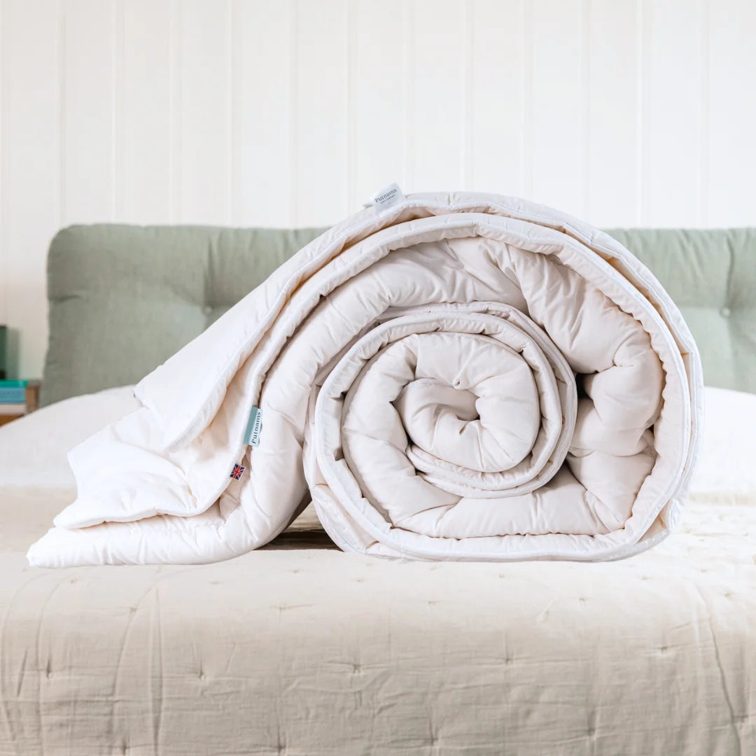 Silk - filled duvets for a luxurious and smooth sleeping experienceBritish Wool Duvet - 100% Cotton Cover - 8-14 Tog Silk - filled duvets for a luxurious and smooth sleeping experienceBritish Wool Duvet - 100% Cotton Cover - 8-14 Tog