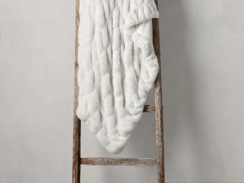 Chenille blankets with a thick and fuzzy textureLuxe Faux Fur Pleated Throw