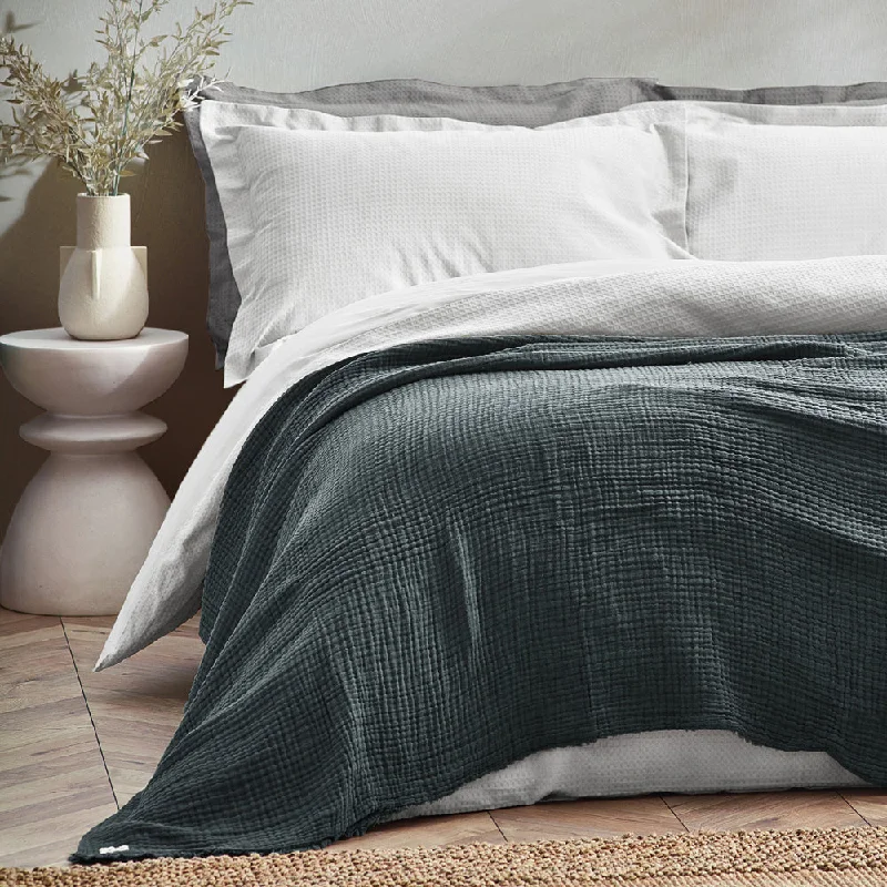 mid - century modern bedspreads with iconic shapes and colors for a stylish spaceLark Muslin Cotton Oversized Throw Dusk mid - century modern bedspreads with iconic shapes and colors for a stylish spaceLark Muslin Cotton Oversized Throw Dusk
