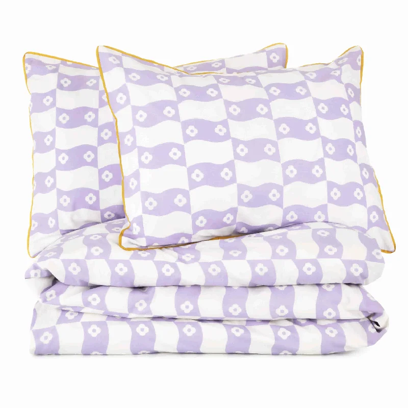 Microfiber - filled comforters that are lightweight and easy to care forWaves Dusty Lavender Comforter Set from Novogratz by Utica