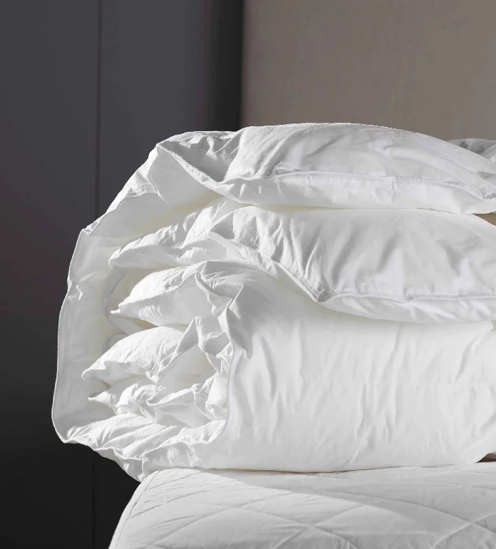 Wool - filled duvets for natural insulation and moisture - wicking propertiesOur Bottle Bedding Duvet