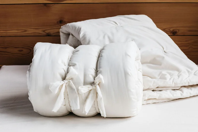 Microfiber - filled comforters that are lightweight and easy to care forAll-Natural Wool Comforter