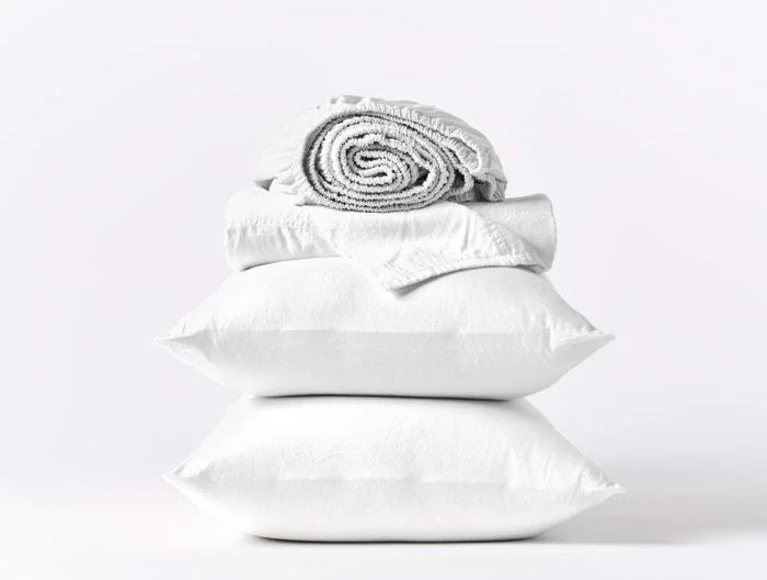Moisture - Wicking Cotton Sheets for a Dry and Comfortable SleepOrganic Relaxed Sateen Alpine White Sheet Sets by Coyuchi Moisture - Wicking Cotton Sheets for a Dry and Comfortable SleepOrganic Relaxed Sateen Alpine White Sheet Sets by Coyuchi